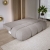 Sofa do salonu pikowana boucle MISTY funkcja spania