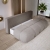 Sofa do salonu pikowana boucle MISTY pojemnik na pościel