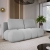 Jasnoszara sofa do salonu pikowana boucle MISTY aranżacja skos