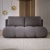 Szara sofa rozkładana do salonu pikowana MISTY boucle front aranżacja
