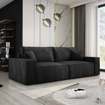 Czarna sofa sztruksowa COBRA w salonie